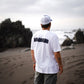 Polera Cicatriz blanca de COA vista por la espalda